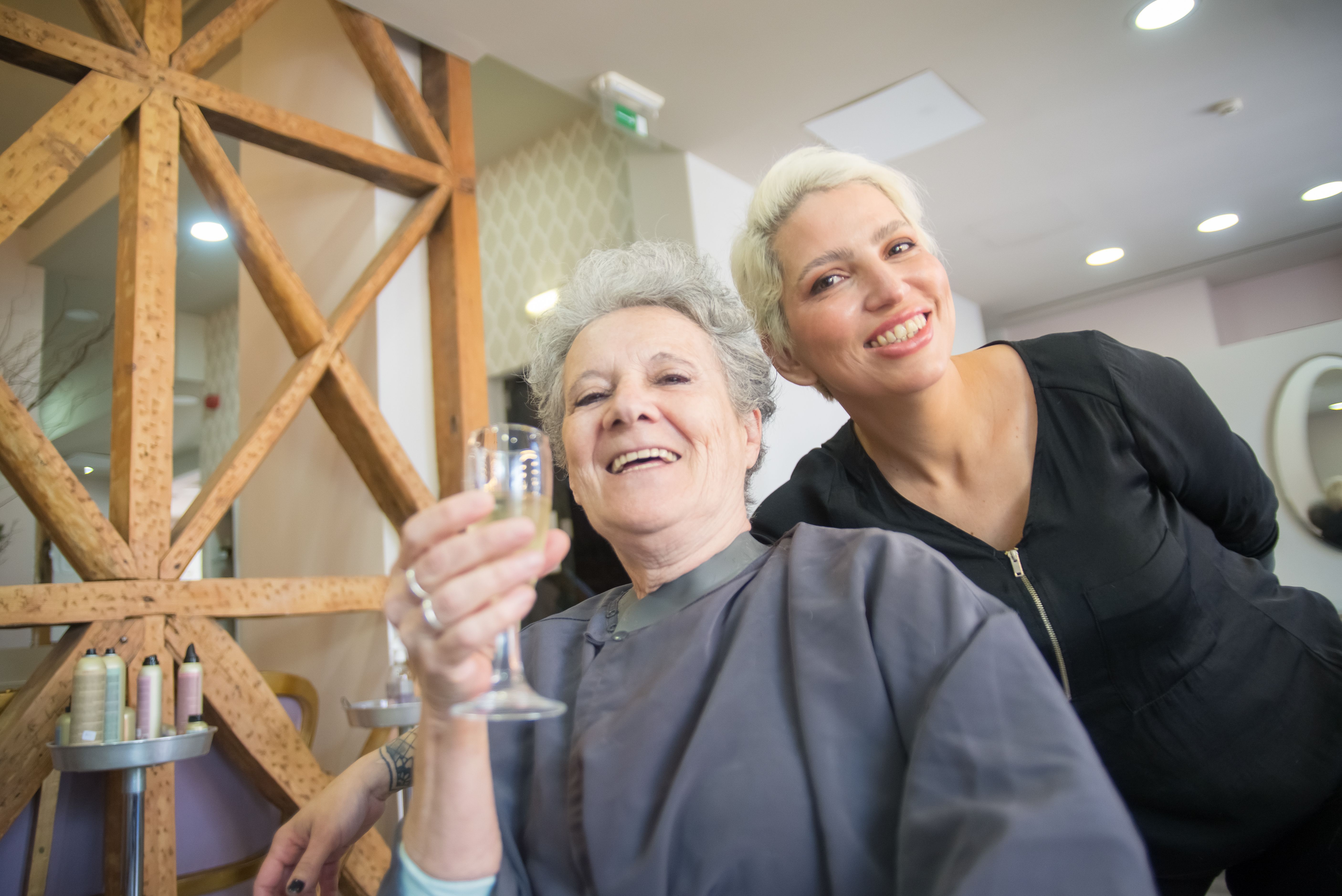 a happy customer after their visit to the salon